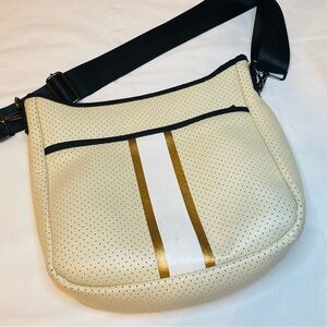 HAUTE SHORE Cream Bag with Black,White,Gold details. Stylish purse!